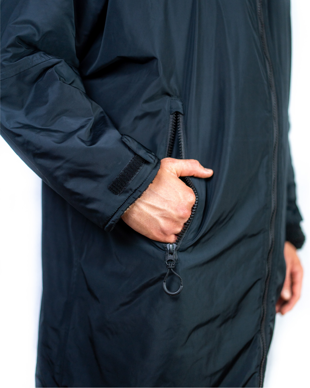 SF_2024_WMantel_Tasche Wärmemantel SWIM